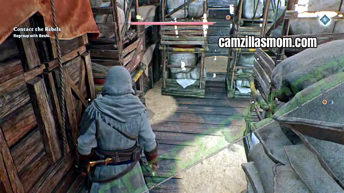 1-to-2-gear-chests-harbiyah-collectibles-assassins-creed-mirage Zanj Uprising Outfit Gear Chest behind the shelves on the Upper Harbor boat in Harbiyah in Assassins Creed Mirage › camzillasmom.com